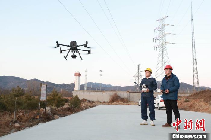 用无人机巡检提升效率  北京电网负荷创冬季历史新高 