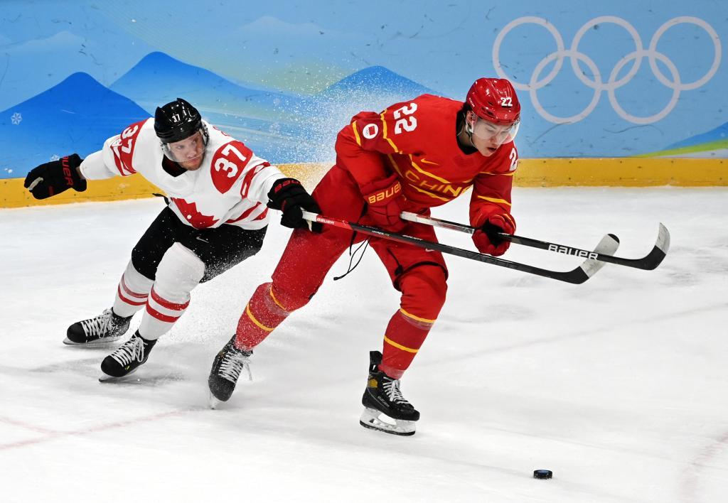 中国男冰不敌加拿大 四队晋级八强