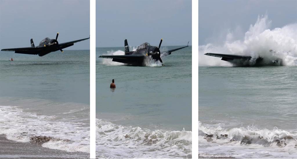 美国海滩上飞来一架二战战机，在众人围观下一头扎进水里